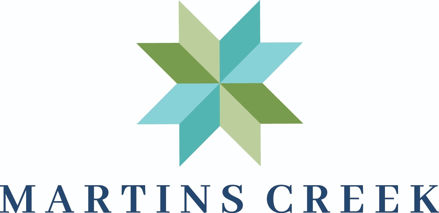 A logo with a star shape and the text "Martins Creek" below it.